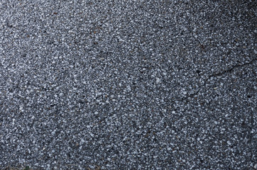 cracked asphalt road.  Parking lot