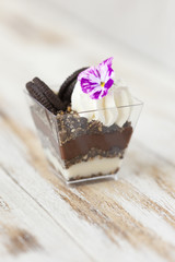 Obraz na płótnie Canvas Trifle black and white chocolate with cookie, sweet dessert.
