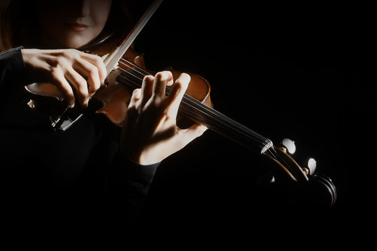 Violin player. Violinist playing violin hands