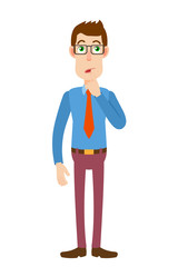 Businessman standing with his finger to his lips