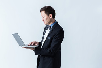 smart handsome asian business man isolated white background