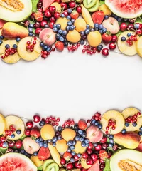 Foto op Plexiglas Vruchten Healthy food background with various  fruits on white wooden background, top view, copy space, frame