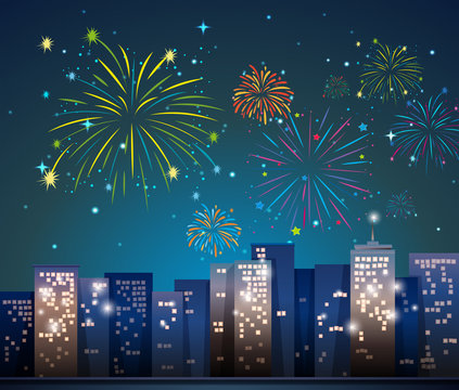 City scene with fireworks at night