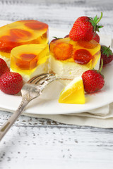 Fruity cake with jelly and strawberries