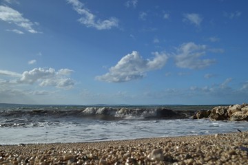 Fototapeta na wymiar Sea waves at the beach