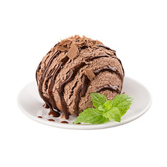 Ice cream brown scoop decorated mint leaves and chocolate sauce on plate, isolated on white background.