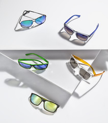 Collection of sunglasses in a stylish arrangement.