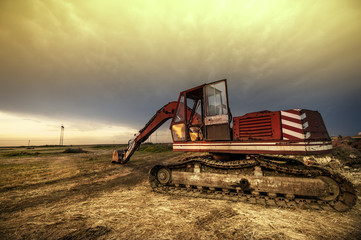 Fototapeta premium Dramatic landscape with bagger