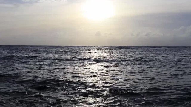 Tropical sea sunset scene in the sea
