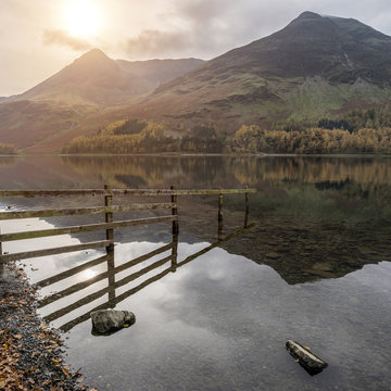 Stuning Autumn Fall landscape image of Lake Buttermere in Lake District England