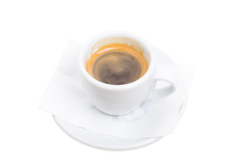 Espresso cup on a plate.