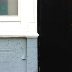 Geometric abstract of a partial view of a window and walls
