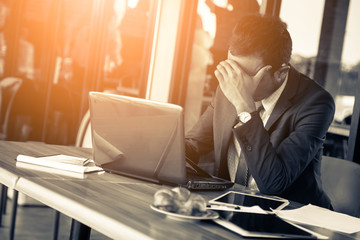 BUSINESS ASIAN MAN STRESS AND SAD BUSINESS FAILURE CONCEPT
