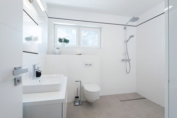Fototapeta na wymiar Modern bathroom interior in modern house