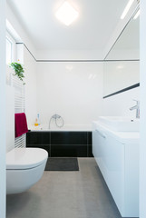 Fototapeta na wymiar Modern bathroom interior in modern house