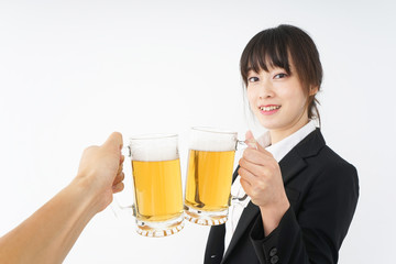Businesswoman in suit cracking a beer