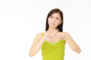 禁止の意思表示をする女性