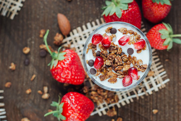Yogurt with granola and strawberries 