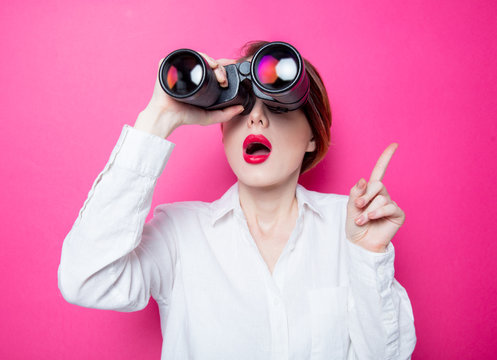 Surprised Businesswoman With Binoculars