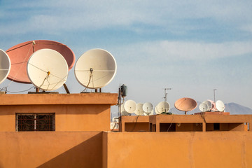 Satelite dishes on roof tops
