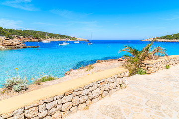 Fototapeta premium View of beautiful coast and blue sea in Cala Portinatx bay, Ibiza island, Spain