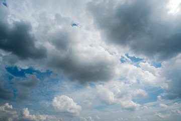 clouds with background,sunlight through very dark clouds background of dark storm clouds,black sky Background of dark clouds before a thunder.