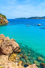 Fototapeta premium Rocks and azure blue sea of Cala San Vicente bay, Ibiza island, Spain