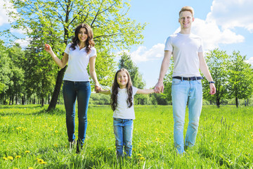 Fototapeta premium Cheerful family in park