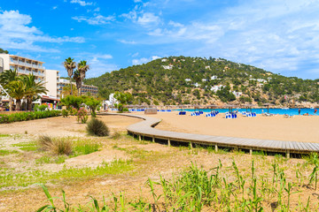 Walkway to beach in Cala San Vicente bay Ibiza island, Spain