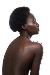 Fototapeta na wymiar Beautiful black girl with metal pins