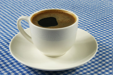 Coffee cup on table