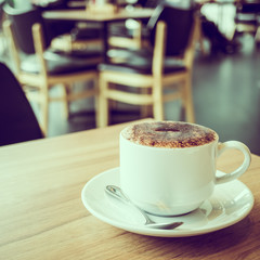 Cappuccino coffee in white cup