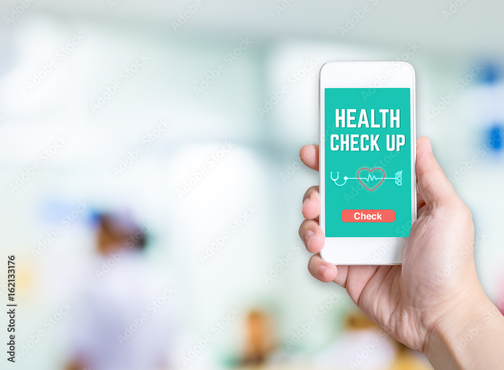 Poster hand holding mobile with health check button and thumb up good or bad results at blur nurse at hospi