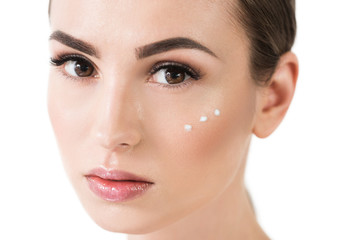 Fototapeta premium Serious attractive girl with decorative cosmetics on face