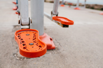 Sports equipment on the city street. The concept of a healthy lifestyle and accessibility of sports training for every person. Available sports equipment in a public place.