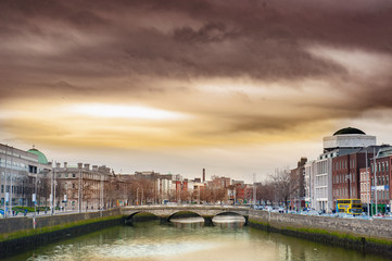 Cloudy on a river bridge in  a town