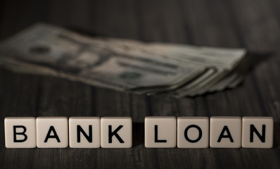 Bank Loan Spelled Out in Tiles