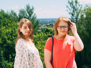two fashion girls . portrait outdoors