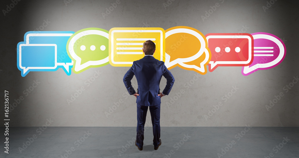 Wall mural businessman using social network interface on a wall 3d rendering