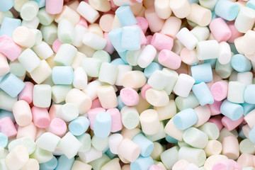 Background or texture of colorful mini marshmallows.