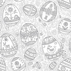 Easter eggs in leaves seamless pattern