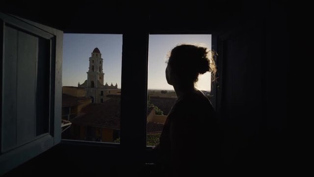 woman open the window