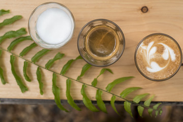 The ingredients of coffee on a wooden desk