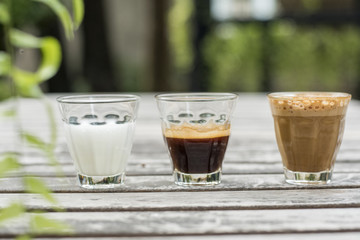 The ingredients of coffee on a wooden desk
