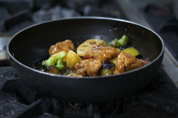 Chicken and vegetables intermix  in vinegar sauce