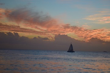 Fototapeta na wymiar Sailing into the Sunset. 