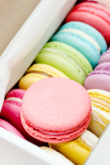 Closeup of delicious french macarons. Colorful cookies.