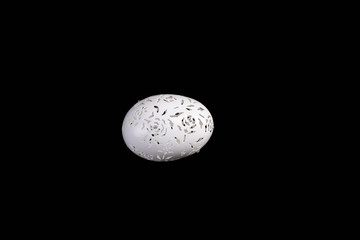 Easter hen's egg with carving.