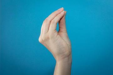 Woman italian hand sign