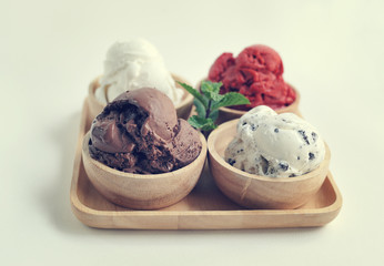 Homemade mixed  Ice cream scoops on wooden bowl